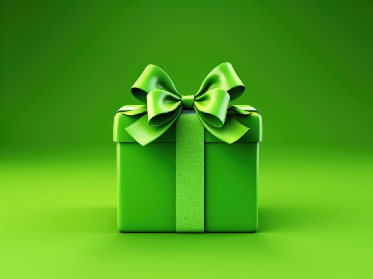 Photo boîte cadeau verte sur fond vert pour noël ou le nouvel an