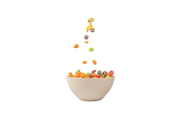 Boîte de céréales colorées pour le petit-déjeuner du matin Corn flakes tombant dans le bol blanc Motion Copyspace