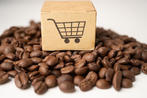 Boîte avec symbole du logo du panier d'achat sur les grains de café, Import Export Shopping en ligne ou service de livraison de commerce électronique expédition de produits, commerce, concept de fournisseur.