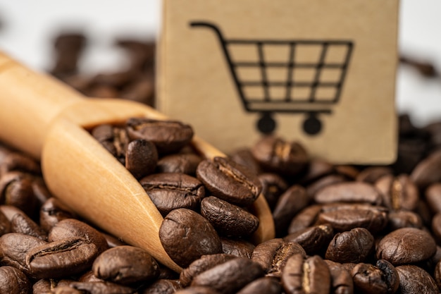 Boîte avec le symbole du logo du panier sur les grains de café,