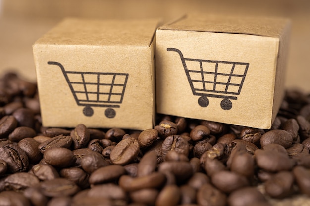 Boîte avec symbole de logo de panier sur les grains de café