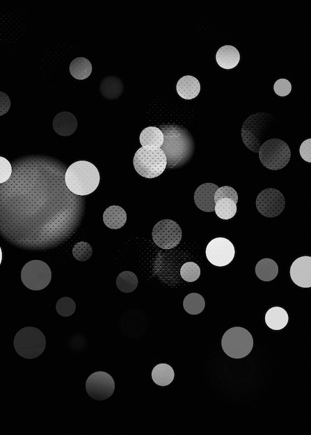 Bokeh défocalisé noir s'allume fond de bannière verticale