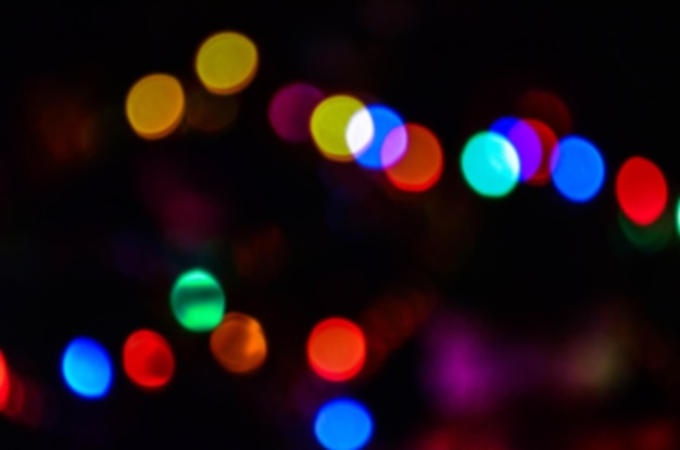 Bokeh s'allume sur fond noir Bokeh abstract lights background