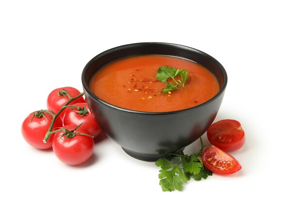 Bol de soupe aux tomates isolated on white