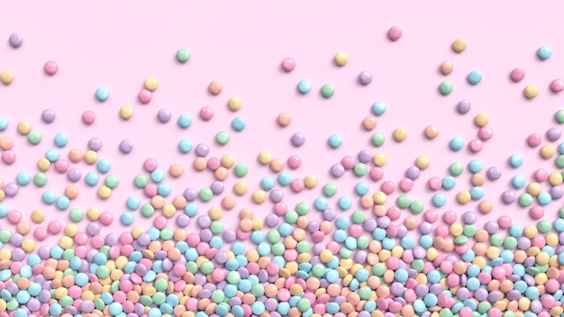 Bonbons au chocolat enrobés colorés dans des tons pastel éparpillés sur fond rose