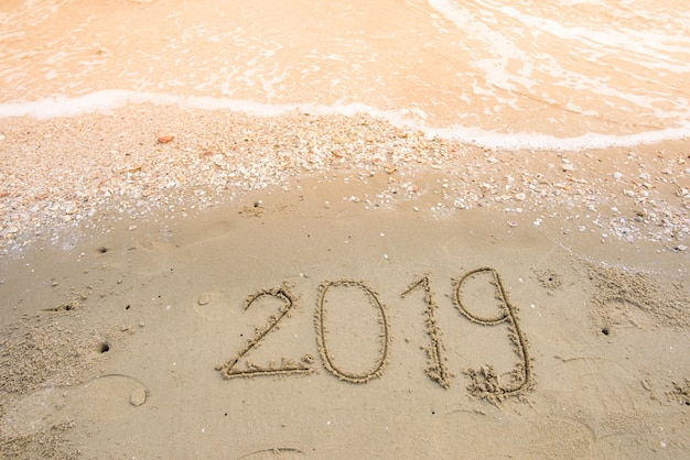 Photo bonne année sur fond de sable