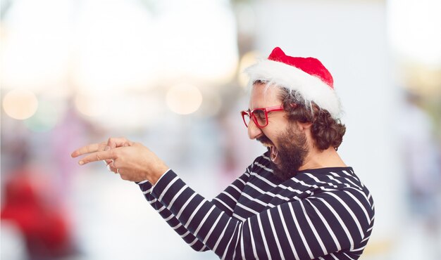 Bonnet de Noel jeune homme. concept de noël