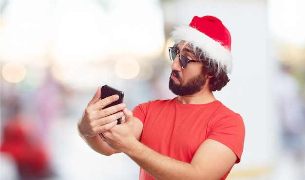 Bonnet de Noel jeune homme. concept de noël