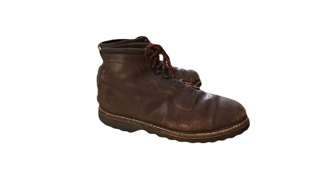 Une botte marron avec le mot boot dessus