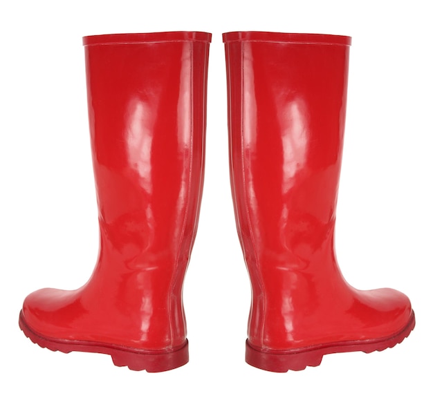 Bottes en caoutchouc rouge sur fond blanc