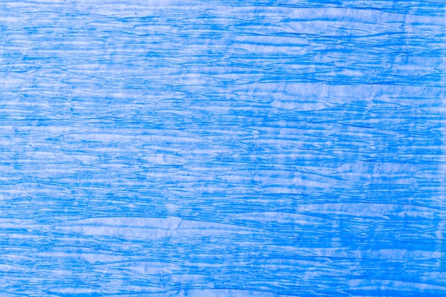 Bouchent fond de texture de papier crépon aux tons bleus