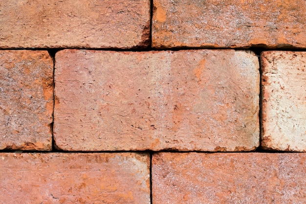 Bouchent la texture du mur de brique et fond de brique rouge