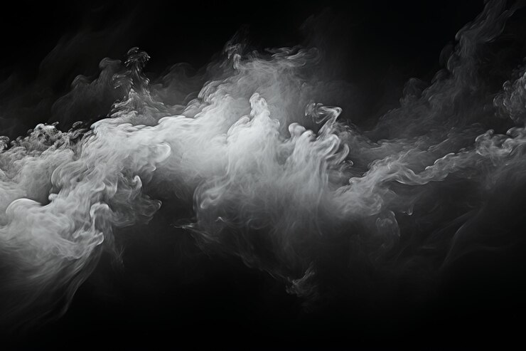 Photo des bouffées dense et moelleuse de fumée blanche et de brouillard sur fond noir