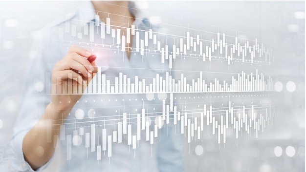 Bougies graphique diagramme graphique stock trading investissement entreprise finance concept médias mixtes double exposition écran virtuel
