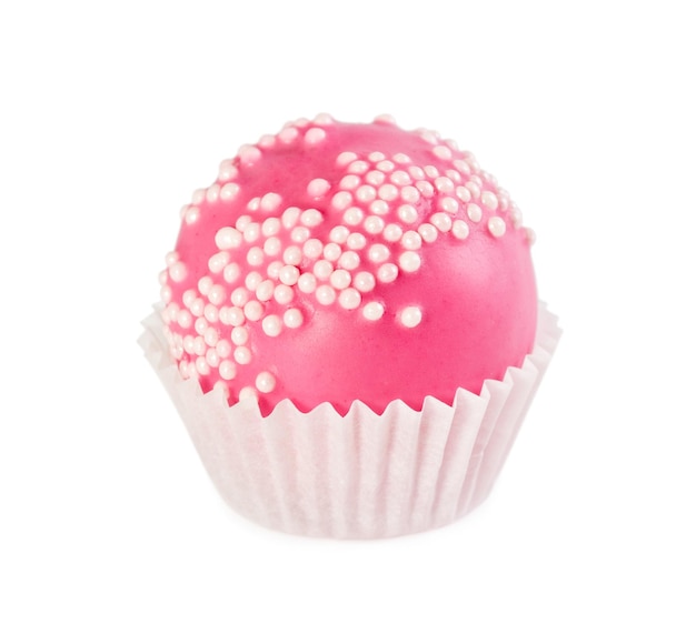 Boule de gâteau en glaçure rose avec arrose sous forme de papier isolé sur fond blanc