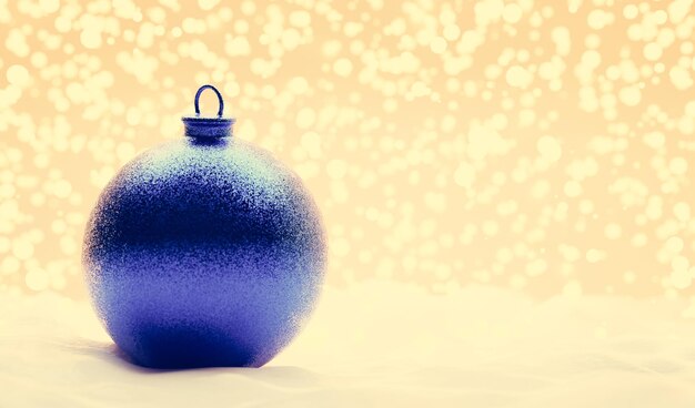 Photo boule de noël bleue scintillante sur fond de lumières dorées enneigées illustration 3d