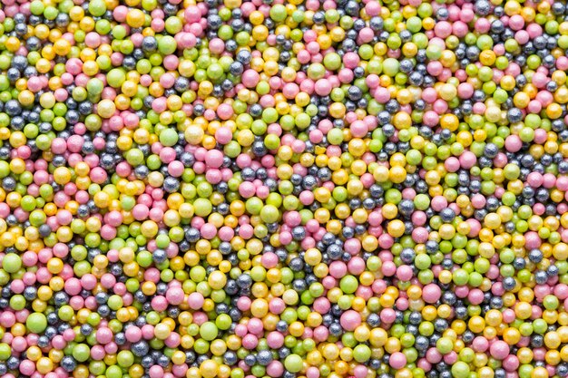 Boules de sucre sucrées multicolores. Motif de petite boule.