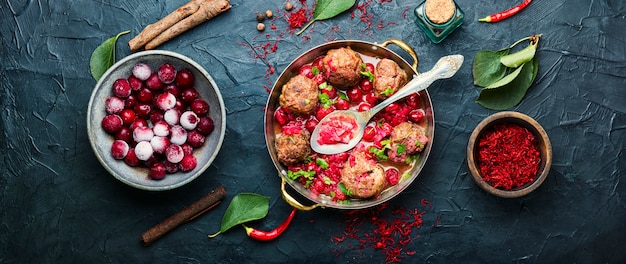 Boulettes d'agneau sauce cerise