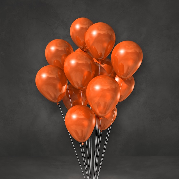 Bouquet de ballons orange sur fond de mur noir. rendu d'illustration 3D