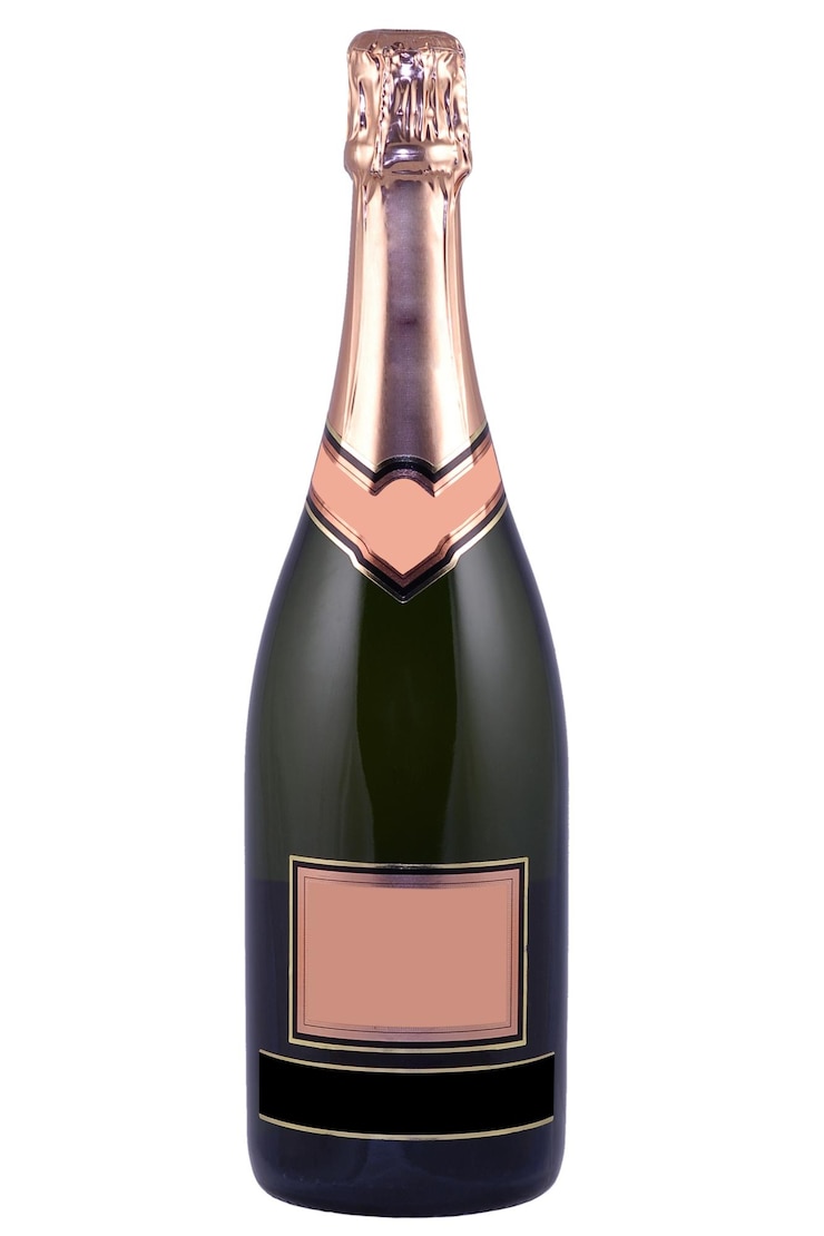 Photo bouteille de champagne avec une étiquette blanche