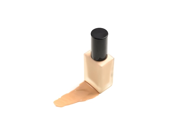 Bouteille avec fond de teint liquide de maquillage isolé sur fond blanc