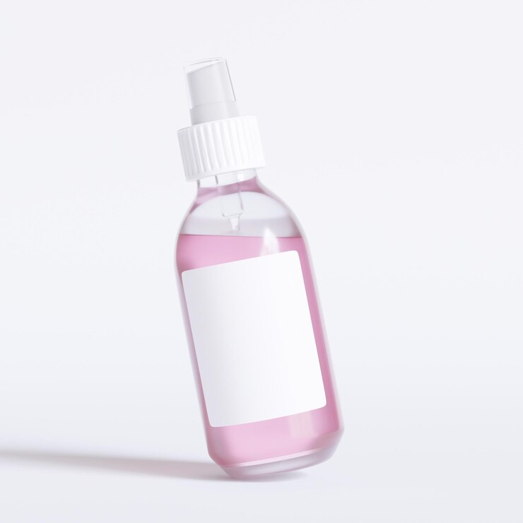 Photo une bouteille de liquide rose avec un carré blanc sur le dessus