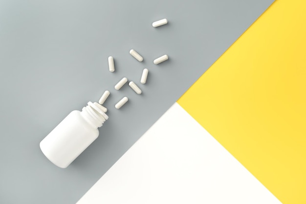 Bouteille de maquette avec des pilules renversées sur fond jaune et gris blanc isolé