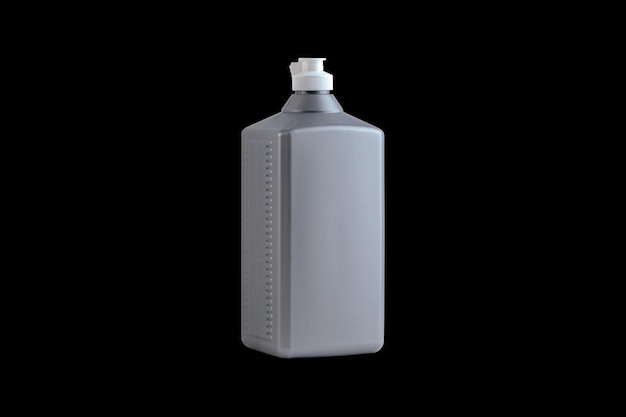 Photo bouteille en plastique gris sur fond sombre