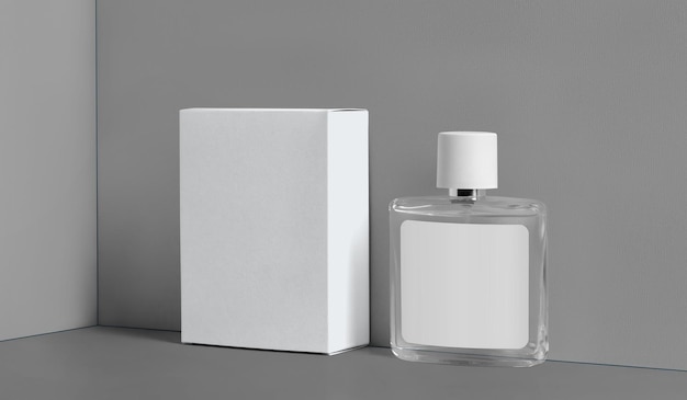 bouteille transparente en verre avec étiquette contenant de parfum boîte en carton blanc pour la conception