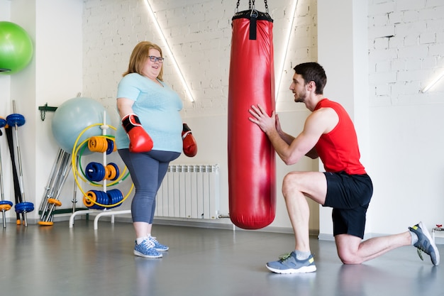 Boxe femme avec son entraîneur