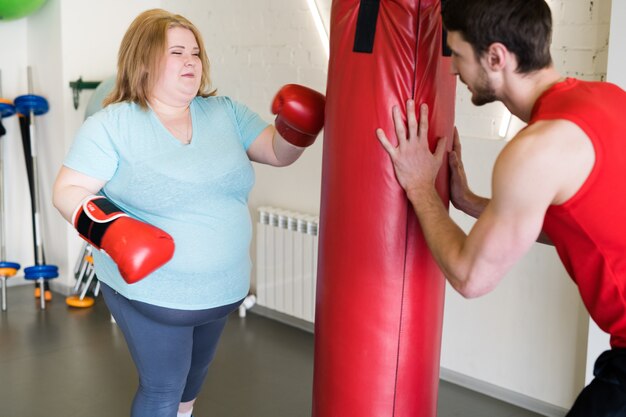 Boxe femme avec son entraîneur