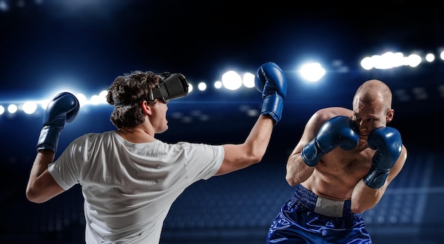 Photo boxe de jeune homme. technique mixte