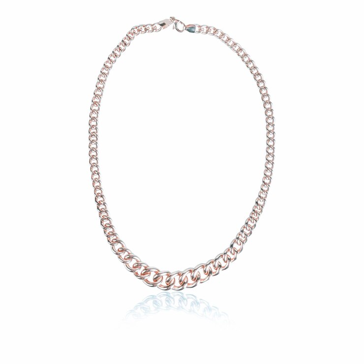 Photo un bracelet rose avec un diamant vert et une bague en diamant.