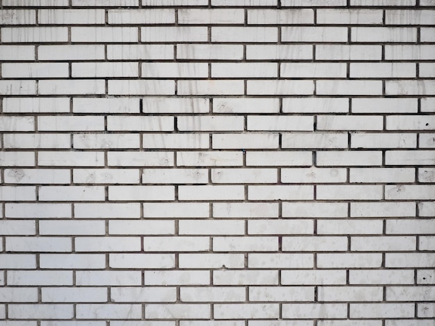Photo brique mur blanc fond