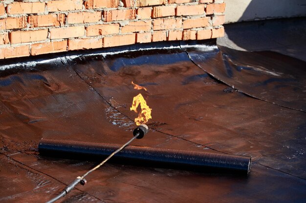 Briseur à gaz et matériau de couverture