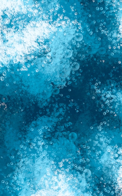 Photo bulles d'air de fond marin sur fond abstrait de l'eau