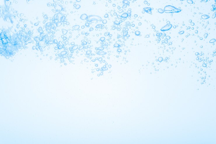 Photo bulles dans le fond de l'eau bleue