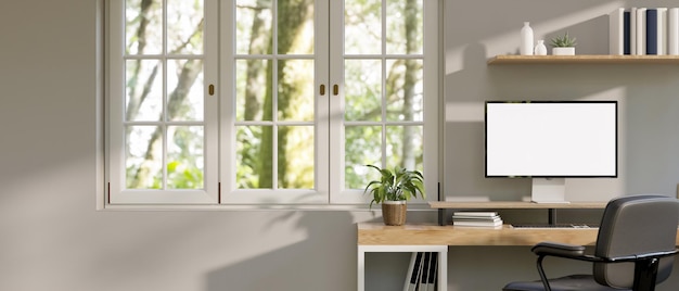 Bureau à domicile blanc minimal avec maquette d'ordinateur sur fenêtre de table en bois avec vue sur la nature