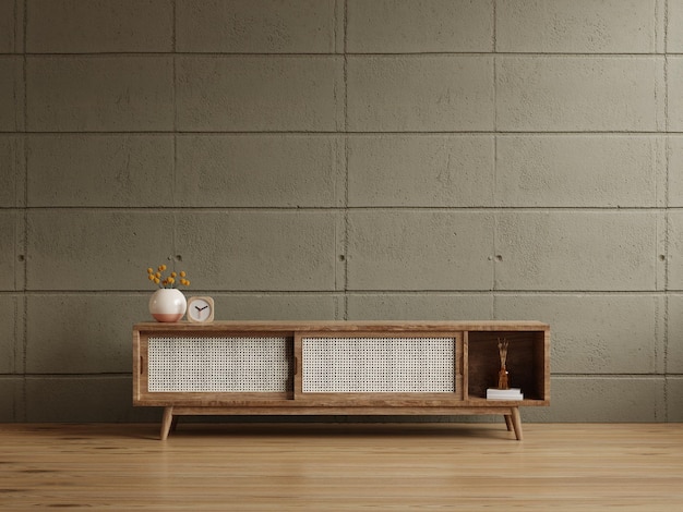 Cabinet pour la télévision dans le salon modèle de mur intérieur sur mur de béton sombre