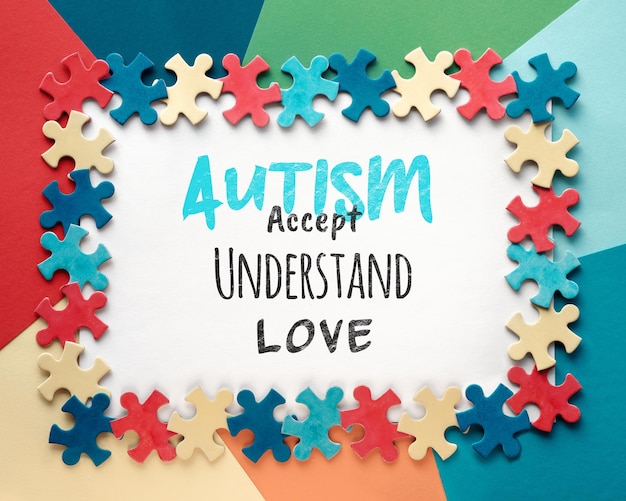 Cadre du Mois mondial de la sensibilisation à l'autisme avec des pièces de puzzle