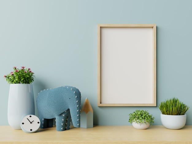 Cadre à l'intérieur de la chambre d'enfant, Cadre sur fond de mur bleu vide.