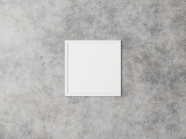 Cadre photo carré blanc sur un mur de béton.