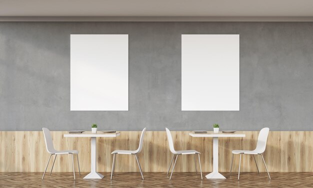 Café familial avec deux affiches et murs en béton