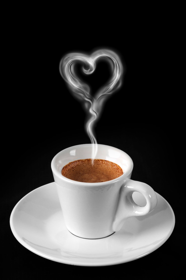 Photo café avec de la fumée de coeur