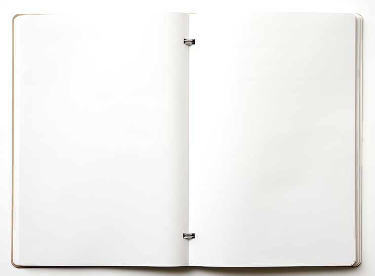 Photo le cahier blanc au-dessus d'une photo de fond blanche