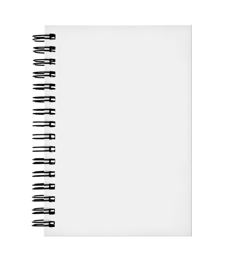 Photo cahier à spirale isolé sur blanc