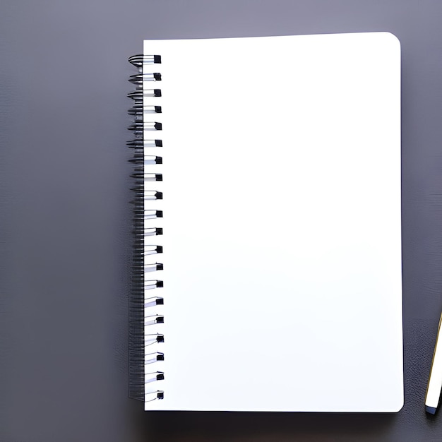 Un cahier et un stylo sont sur une table.