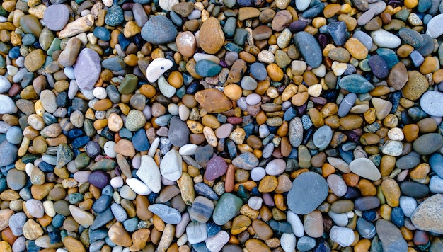 Cailloux sur une plage, fond de cailloux