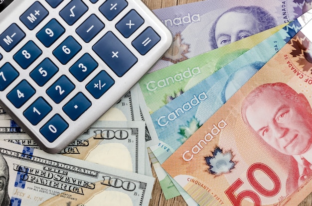 Calculatrice avec dollar usd et cad sur 24