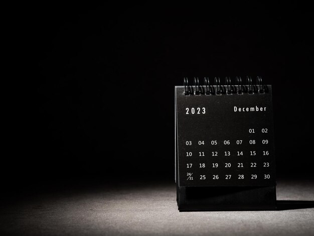 Calendrier de décembre 2023 sur fond noir